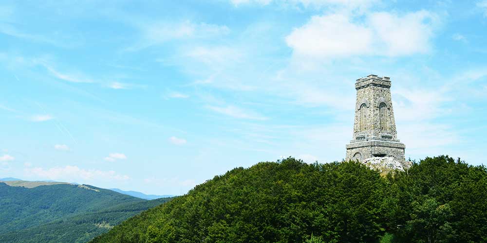 Historical cannons and defensive positions at the base of the Shipka Monument